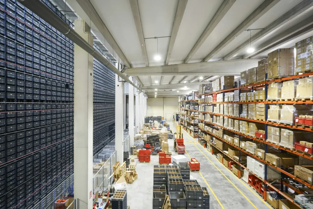 Warehouse aisle with racking and boxed stock